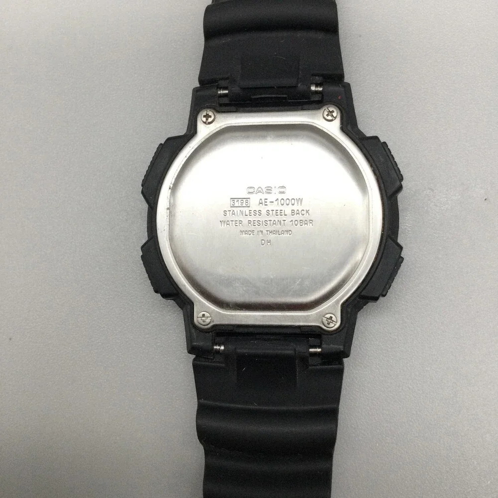 Casio 3198 AE1000W Mens Watch 44mm World Time Digital Black 5 Alarms WR100M